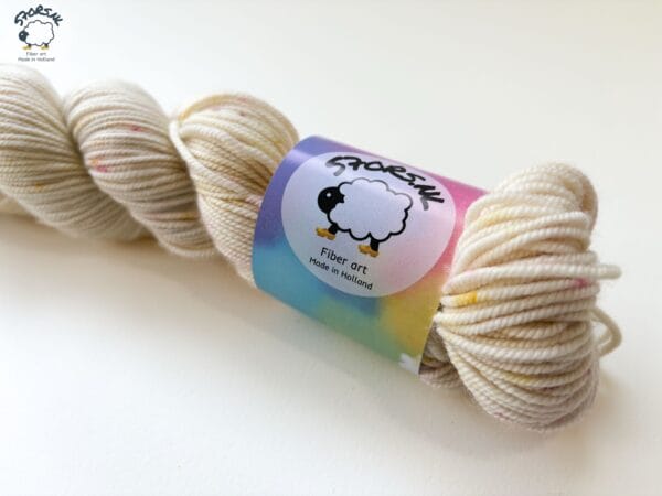 51aae6a4-8df2-4a84-937d-5fdb99fdd424 Cupid's Cheeks - Hand-Dyed Merino Yarn in Soft White with Speckles