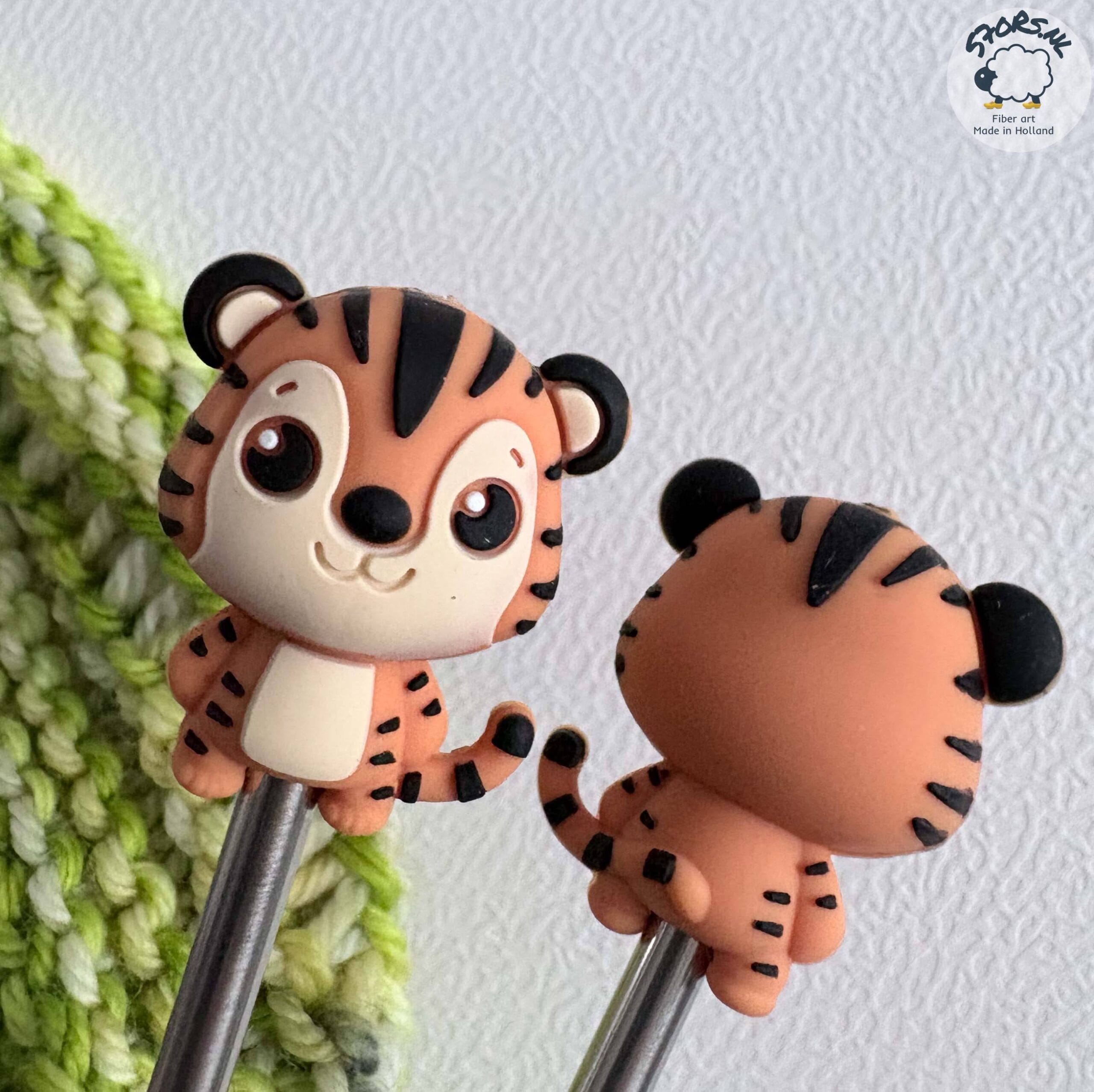 51A85D1C-C252-45BD-9501-04473FD6E79E Gnome needle stoppers for knitting needles.